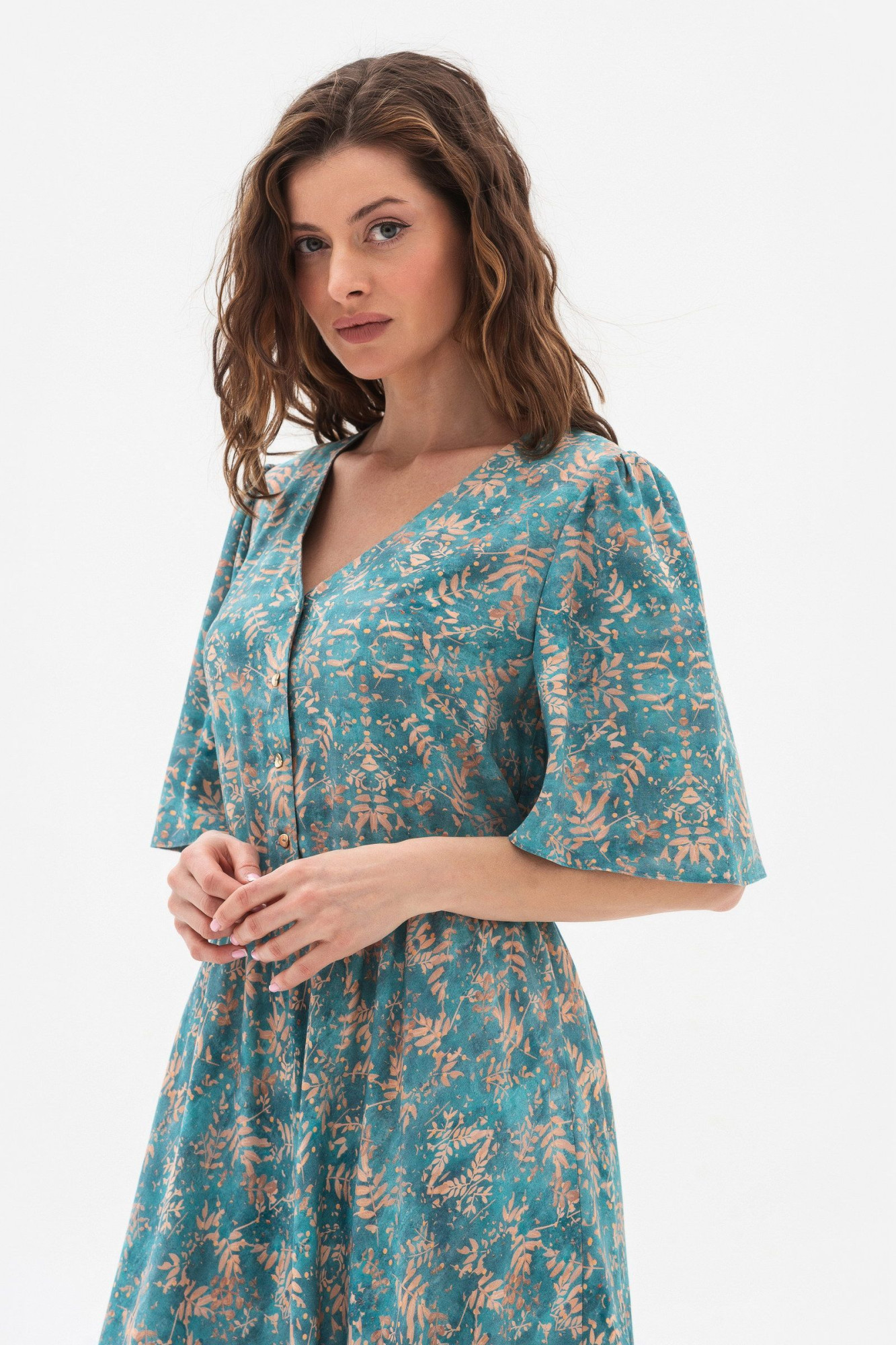 Сукня зі штапелю напівприталеного силуету бірюзового кольору Ортія