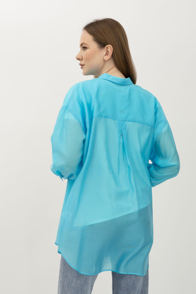 Подовжена напівпрозора блуза блакитна  в стилі оверсайз Леора 01