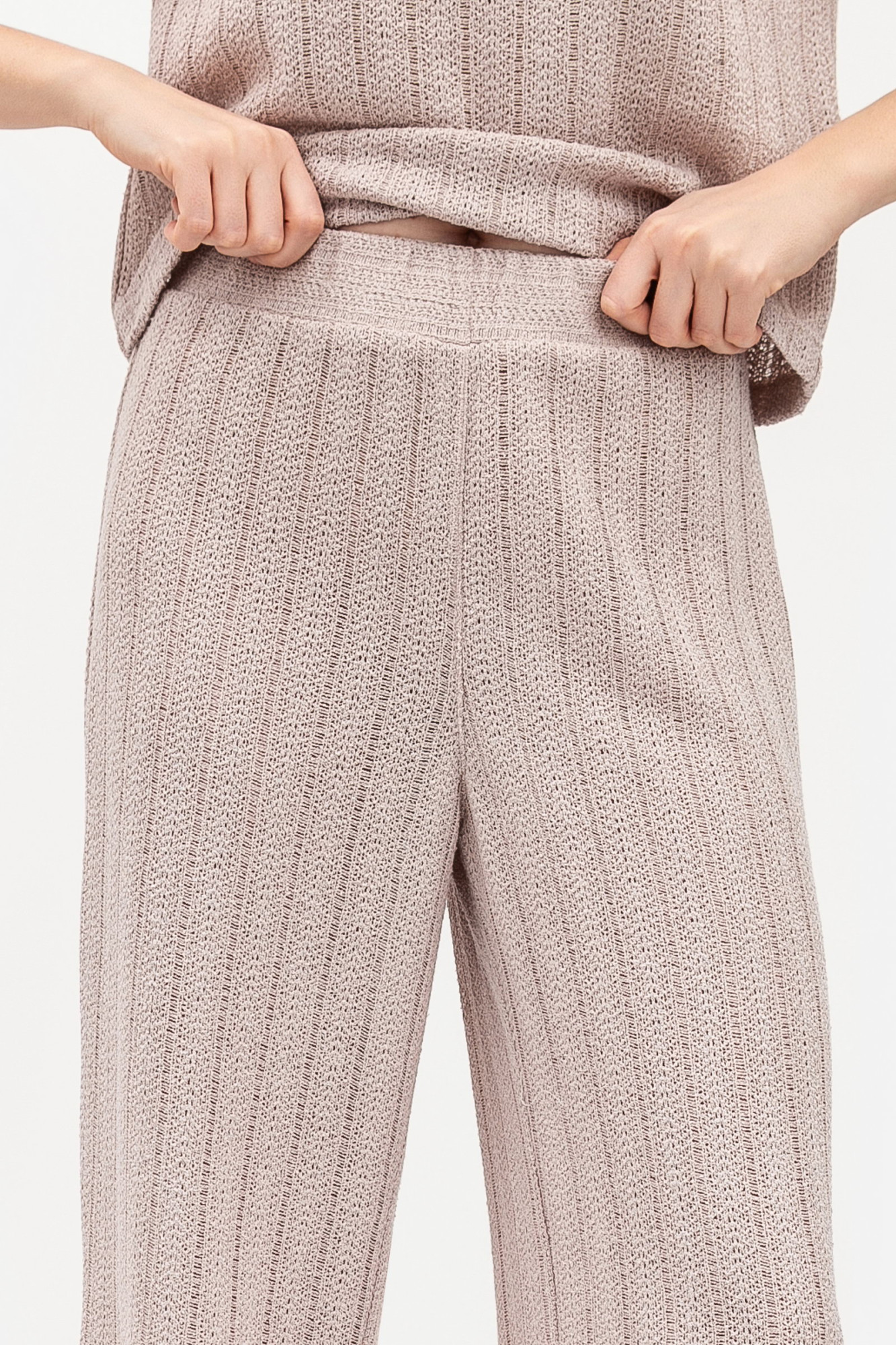 Брюки трикотажні вільного силуету бежевого кольору Екліна 01